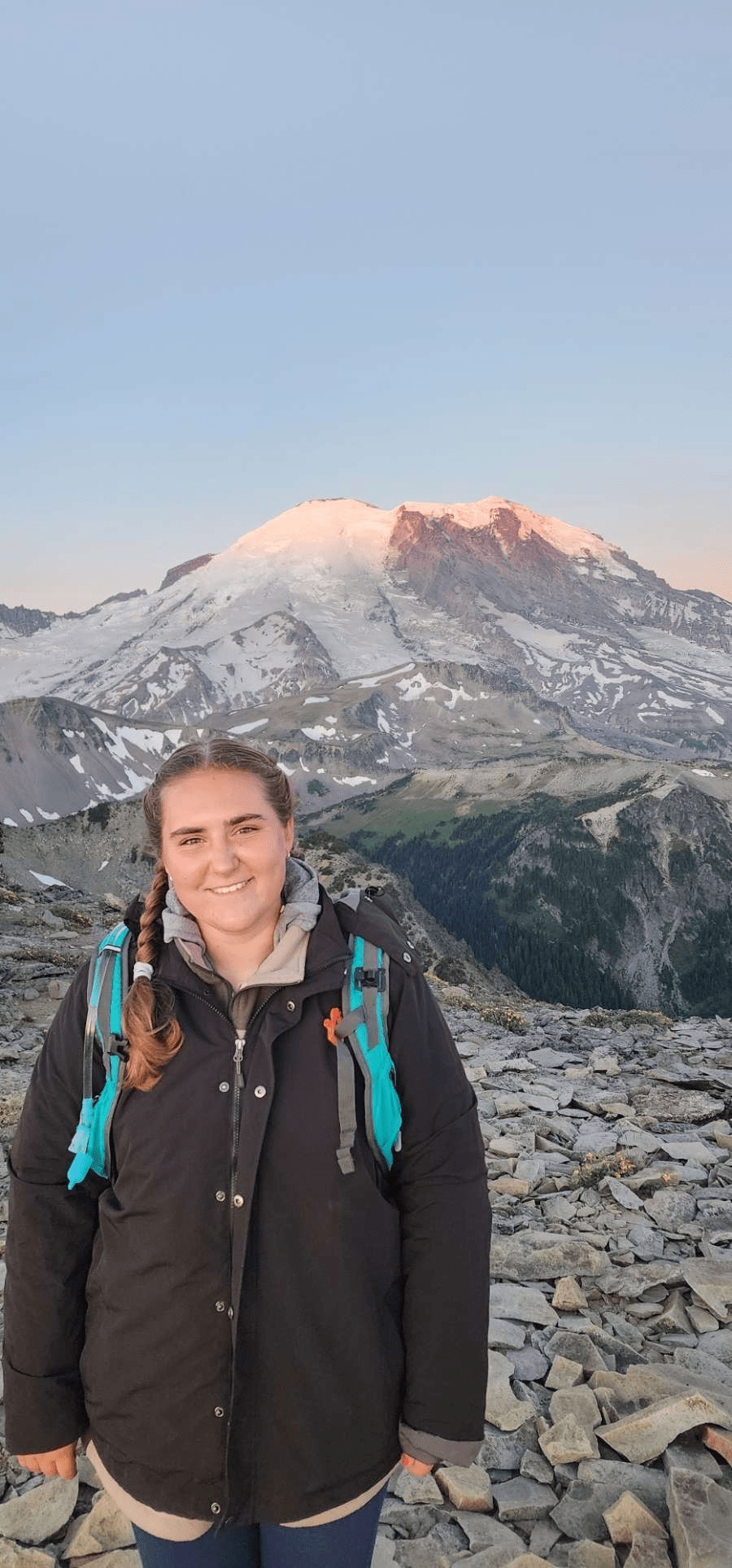 Ashleigh standing in front of a mountain