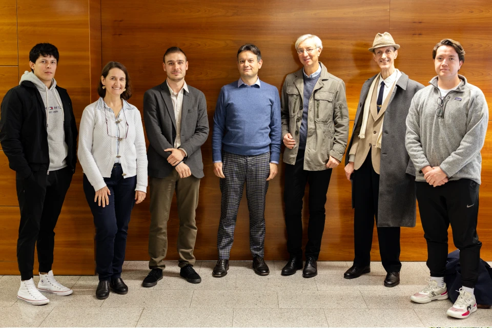 A group of people standing in a row