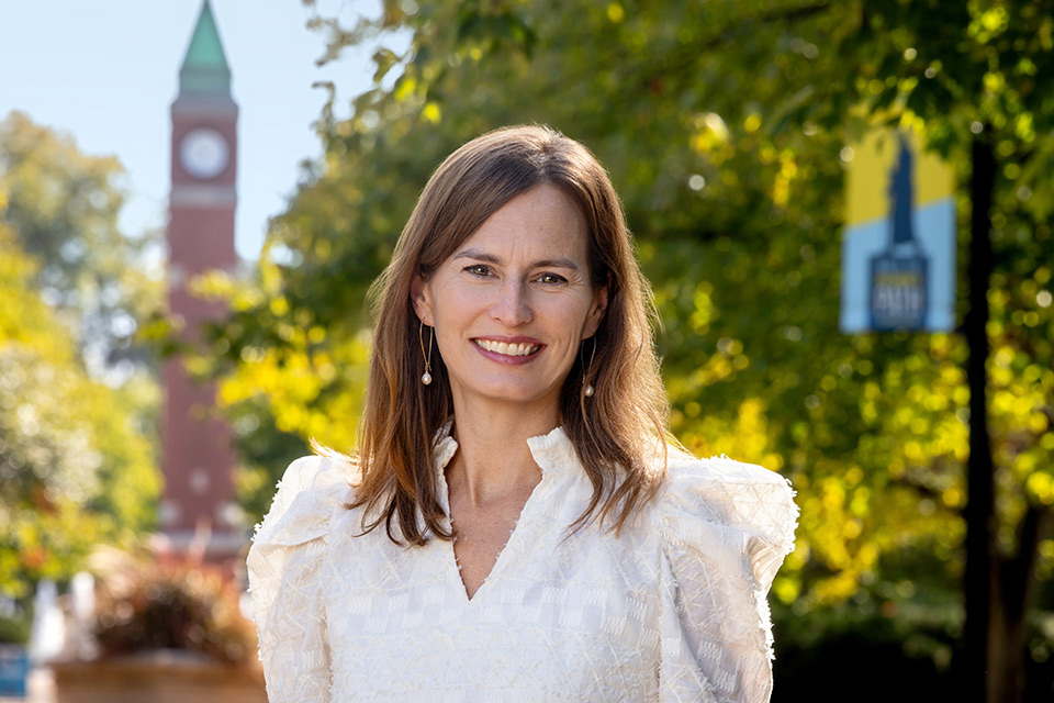 Beth O'Leary A headshot of Beth O'Leary taken in front of the SLU clock tower